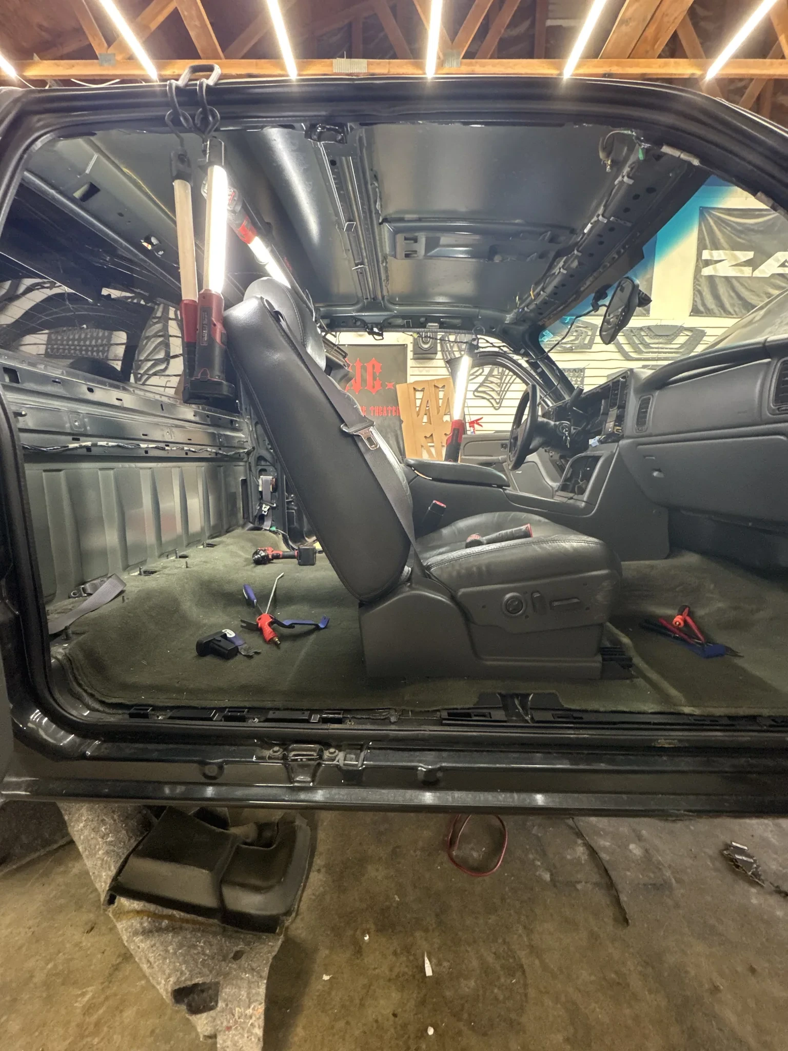 Silverado extended cab interior stripped to bare metal with seats and headliner removed